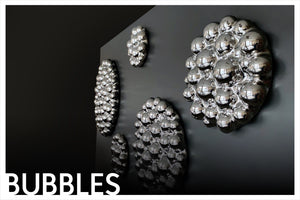 3D wall mirror decor featuring a bubbles-inspired glass composition with reflective surfaces.
