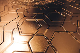 closeup of upscale wall panel named aisha in gold finish