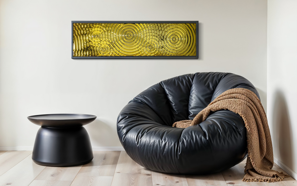 Gold wave-patterned glass mural from the Interference 5 Drops series, adding a luxurious touch to a modern living room decor.