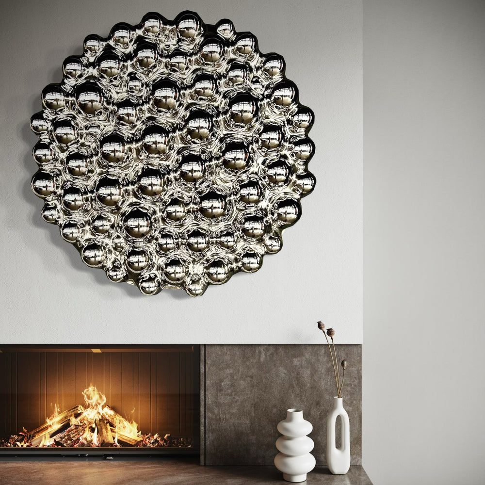 A modern 3D bubbles wall sculpture with reflective mirror spheres, enhanced by ambient blue backlighting. 