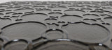 Closeup of ornamental semi transparent glass wall panel 'Eclipse'