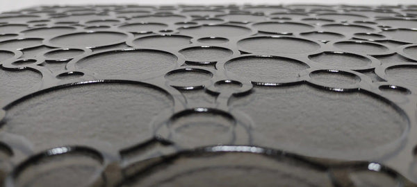 Closeup of ornamental semi transparent glass wall panel 'Eclipse'