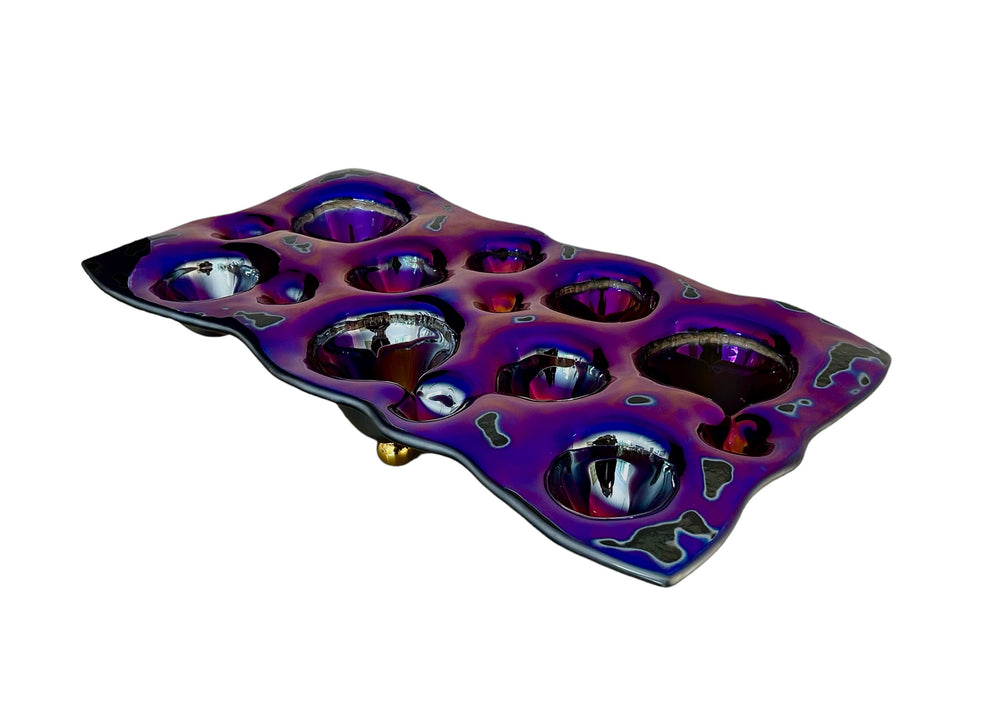 Piatto viola in metallo liquido