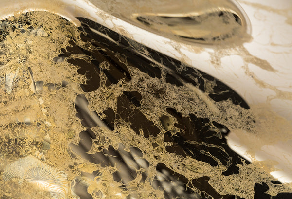Close-up of Aqua Old Gold glass panel, highlighting its intricate texture, organic gold patterns, and reflective surface