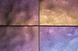 Chameleon glass wall panels with an iridescent metallic finish, shifting between gold, bronze, and purple hues. A luxurious and modern decorative element for upscale interiors