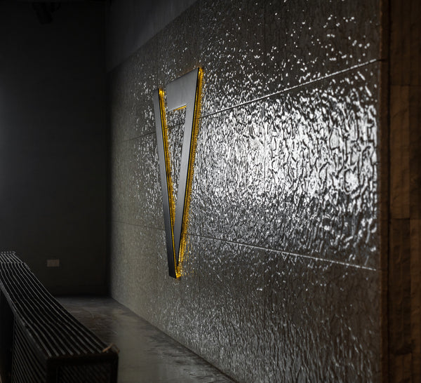 Textured champagne glass wall panels with a high-gloss finish, accentuating light reflections and enhancing upscale interior aesthetics.