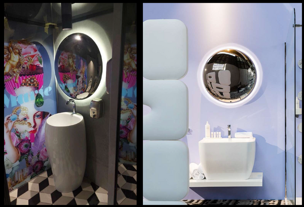 Luxury bathroom featuring Drop of Mercury mirrored wall art, blending reflective design with modern aesthetics.