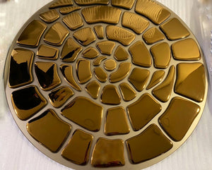 Gold spiral mirror wall decor with a high-gloss reflective finish and organic design.