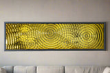 Gold wave-patterned glass mural from the Interference 5 Drops series, adding a luxurious touch to a modern living room decor.