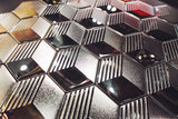 Angled close-up of Hexagon Silver glass panel showcasing its reflective and textured design.