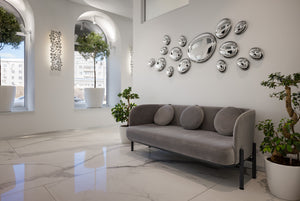 Modern 3D drops wall art in a luxury interior with reflective metallic accents