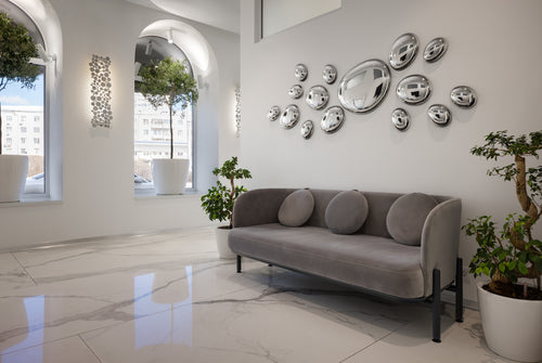 Modern 3D drops wall art in a luxury interior with reflective metallic accents