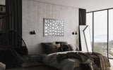 Elegant bedroom featuring a stunning glass wall art panel, complementing a modern, dark-toned interior with a scenic window view