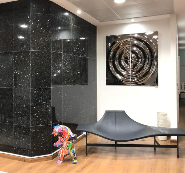 Interior with silver circular interference x4 glass panel