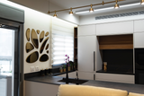 Reflecting mirror wall decor with organic drop shapes mounted in a modern kitchen