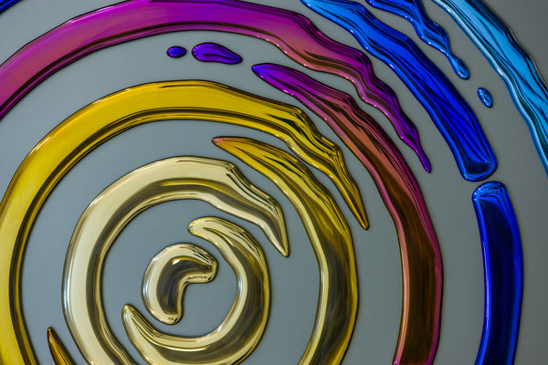 Contemporary 3D glass wall art with a dynamic circular design, blending gold, blue, and violet hues.