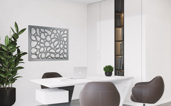 Contemporary office with sleek white furniture and a decorative glass panel, adding a stylish architectural element.