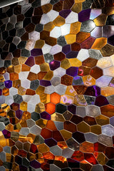 Hexagonal mosaic tile pattern with metallic colors