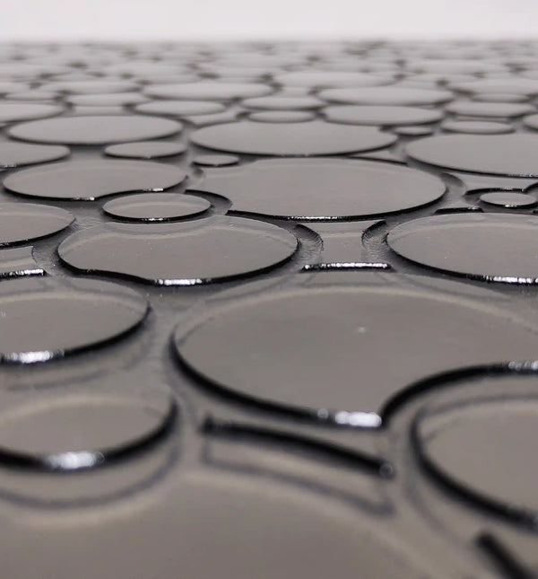 Backside closeup of ornamental semi transparent glass wall panel 'Eclipse'