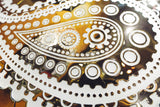 A close-up shot of the Paisley Pattern mirrored glass wall panel focusing on the ornamental paisley details with a shimmering metallic finish.
