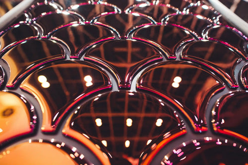 Close-up photo of mirrored glass wall panel Palm Tree