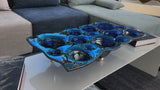 Piatto indaco in metallo liquido