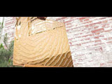Artistic fingerprint gold wall panel showcased in a luxury decor YouTube video.