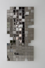 Decorative Tetris bathroom accessory with a heated towel warmer, designed for upscale interiors.