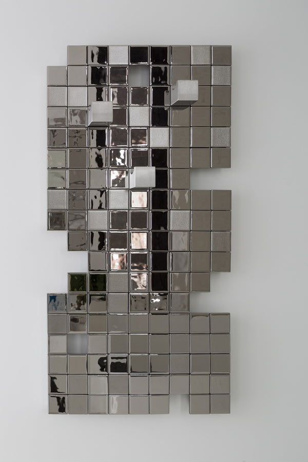Decorative Tetris bathroom accessory with a heated towel warmer, designed for upscale interiors.